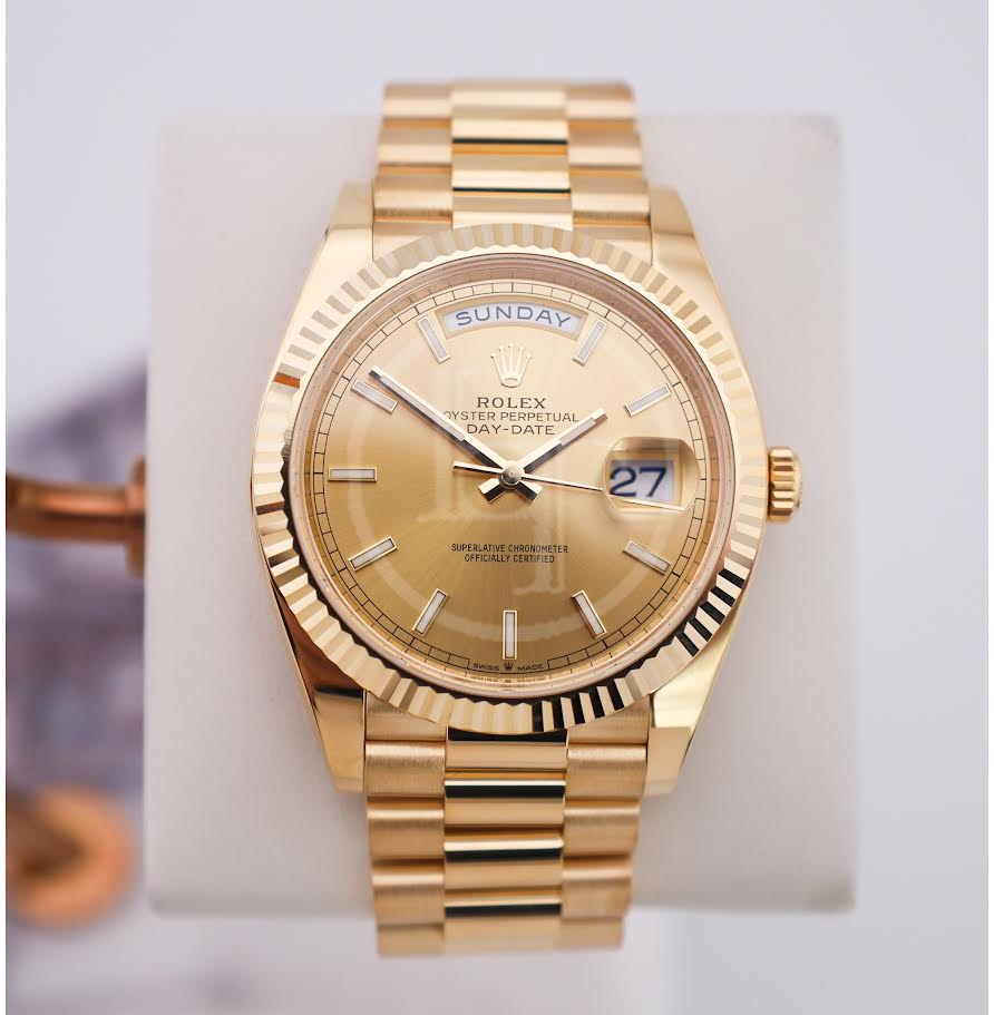 0_b23c56f3-59ab-4572-9b96-524fbfe747c3.jpg Rolex Day-Date 40 Yellow Gold Champagne Index Dial & Fluted Bezel President Bracelet 228238 - - 图片 1